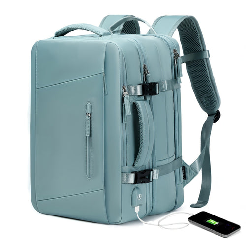 Expandable light blue backpack with multiple compartments and a phone charging cable, on a white background.