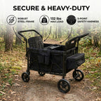 Black heavy-duty stroller with features highlighted on a forest path background